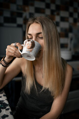 person drinking coffee