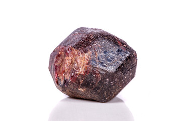 Macro of a mineral garnet stone on a white background