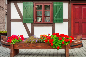 Fototapeta na wymiar Beautiful architecture of traditional fisherman house in Hel town. Poland.