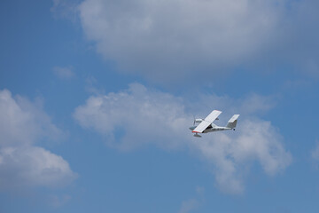 Seaplane in the sky against the background of clouds