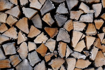 solid texture of firewood sold for heating close up