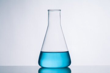 conical flask with blue liquid.