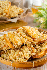 Pisang goreng is a fritter made by deep frying battered plantain in hot oil. The batter most commonly uses a combination of flour, either wheat, rice flour, tapioca or bread crumb.