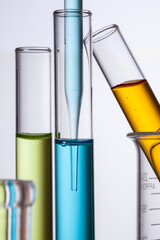 close up of test tubes with color liquid for analytical. science and medical concept.