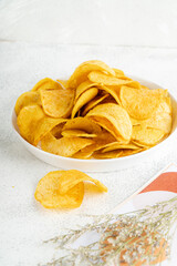 Potato chips are thin strips of potato that are deep fried or baked until crisp. Potato chips are generally served as an appetizer or snack.
