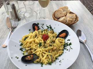 Linguine with mussels and saffron served in the old town of Cassis, France.