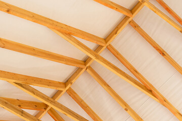 Wooden lathing of the roof of an unfinished house