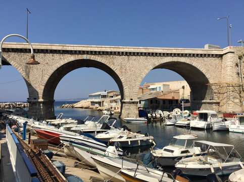 The Vallon des Auffes is a little traditional fishing haven in the Endoume neighborhood of Marseille. A  concrete arched bridge crosses the small Proven&ccedil;al fishing village and port.