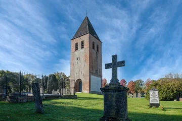 Gordijnen The cemetery of Joure, Friesland with medieval church tower, Friesland province, The Netherlands © Holland-PhotostockNL