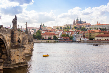 Fototapeta na wymiar View of colorful old town and Prague castle with river Vltava, Czech Republic