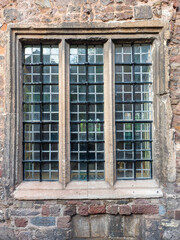 Tudor stone framed window in an old priory building