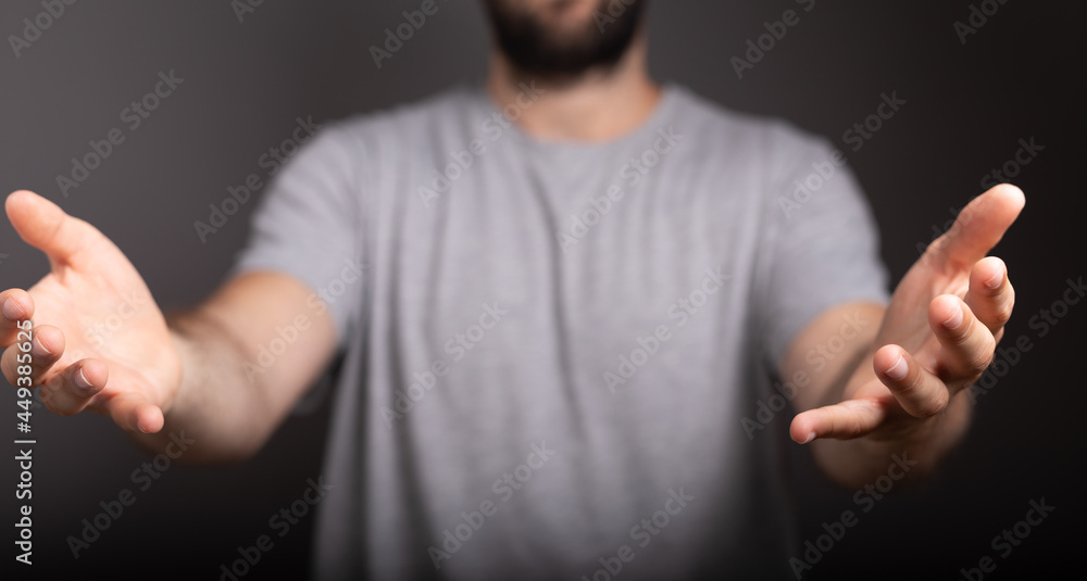 Poster man showing his empty hand.