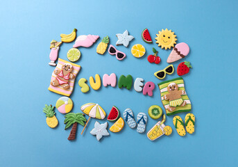 Gingerbread couple chilling on tropical beach imaginary place with sugar decorated summer theme cookies