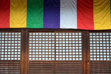 Traditional Japanese sliding doors and 5-colored curtain in temple　五色幕で飾られた寺の外観 障子戸の入口
