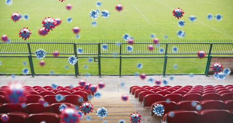 Covid-19 cells against empty seats in sports stadium