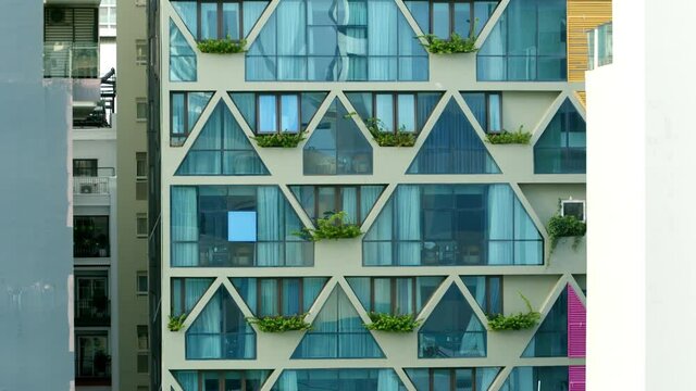 Vietnam, Green Planet. Modern and ecological skyscrapers with many trees on each balcony. Bosco Verticale. Modern architecture, vertical gardens, terraces with plants. Blue sky