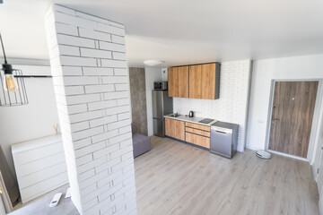 Kitchen and living room of loft apartment