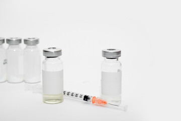 vaccine, medicine, vial, syringe for injection. Vaccination, treatment for coronavirus Covid 19.
