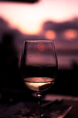 glass of wine during sunset