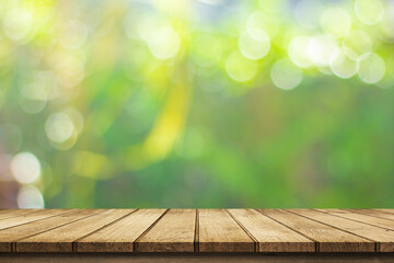 Wooden table with bokeh background