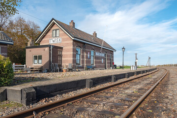 Fototapeta na wymiar Historic wall advertisement at Station Twisk (1887) op de lijn Hoorn-Medemblik, Noord-Holland Province, The Netherlands