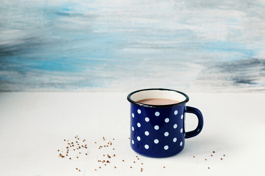 Mug with cocoa. Close up.Background with copy space.