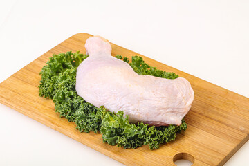 Raw chicken leg for cooking