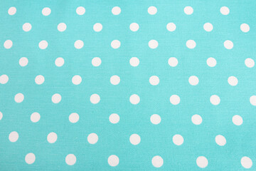Turquoise dotted fabric - retro background.