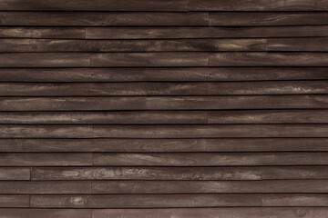 Old Wooden wall brown color and vintage pattern in sun light for background and texture