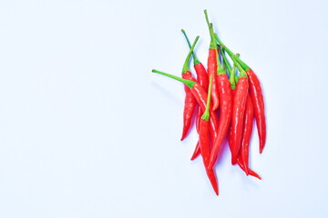 fresh red chili pepper arranging on white background 