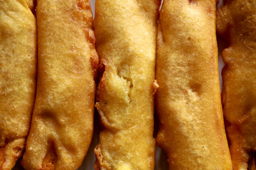 Pazhampori, a traditional Kerala tea time snack made of maida and sliced ripe banana, selective focus