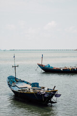 Naklejka na ściany i meble fishing boat at sea of Thailand