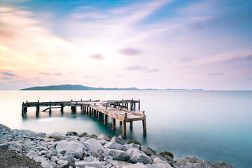 Fototapeta premium dock and pier at sea in twilight long exposure