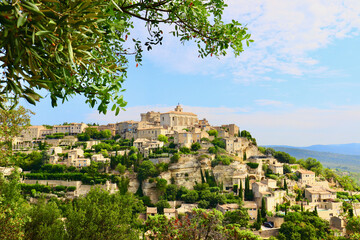 A view of the medieval, hilltop village of Gordes in the Vaucluse department of Provence,  France. - obrazy, fototapety, plakaty