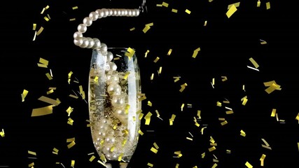 Golden confetti falling over pearl beads falling in champagne glass against black background - Powered by Adobe