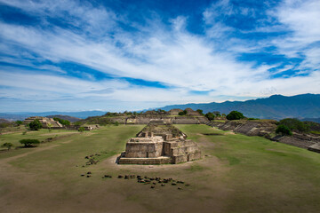 View of the ancient ruins of the Monte Albán pyramid complex in Oaxaca, Mexico - obrazy, fototapety, plakaty