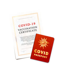 COVID-19 vaccination certificate and passport on white