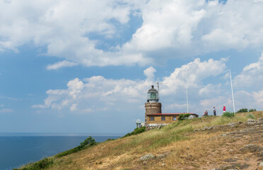 Kullens Fyr, the lighthouse at Kullaberg coastline cape in Scania, Sweden - obrazy, fototapety, plakaty