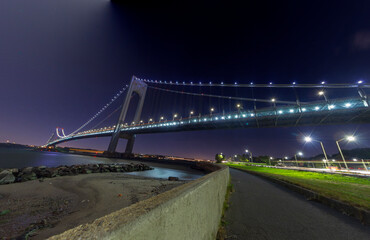 Fototapeta na wymiar A long exposure of the Upper Bay and the Verrazzano-Narrows Bridge, New York, USA
