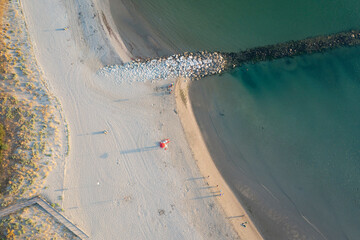 Birds view drone of sandy beaches, Adriatic sea and reef. Adriatic coast. Emilia Romagna region,...
