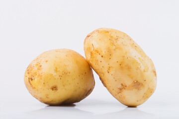 Potatoes on a white isolated background. 
