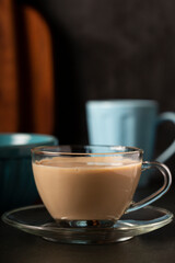 Cup of coffee with creamy milk.
