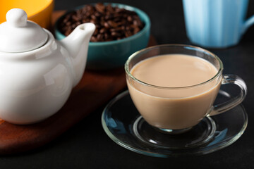 Cup of coffee with creamy milk.