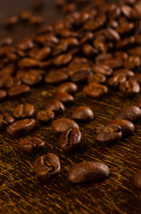 Natural background for Cafe menu or brochure template - macro photo of brown roasted coffee beans, close up