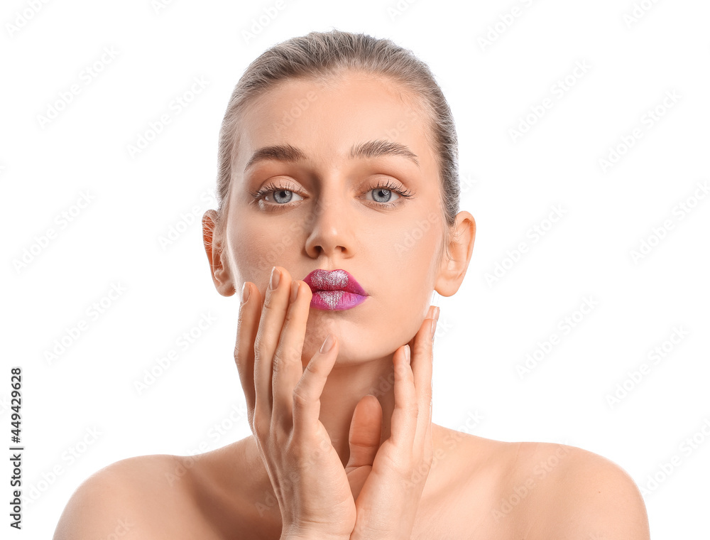 Poster beautiful young woman with heart on lips against white background