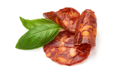 Spanish pork chorizo sausage slices, close-up, isolated on white background.