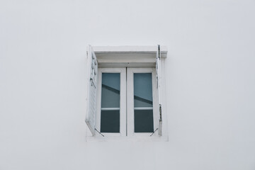 window on white wall