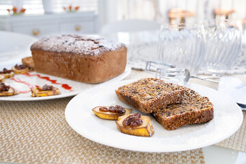 Chocolate cake served for breakfast on the table in the restaurant