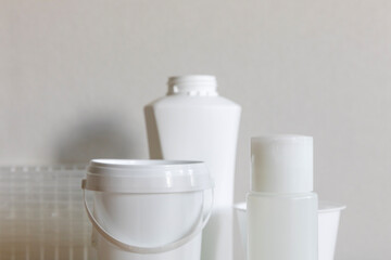 Different types of plastic package in everyday life. Bottles cleaned from labels and prepared for separate collection of waste