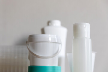 Different types of plastic package in everyday life. Bottles cleaned from labels and prepared for separate collection of waste